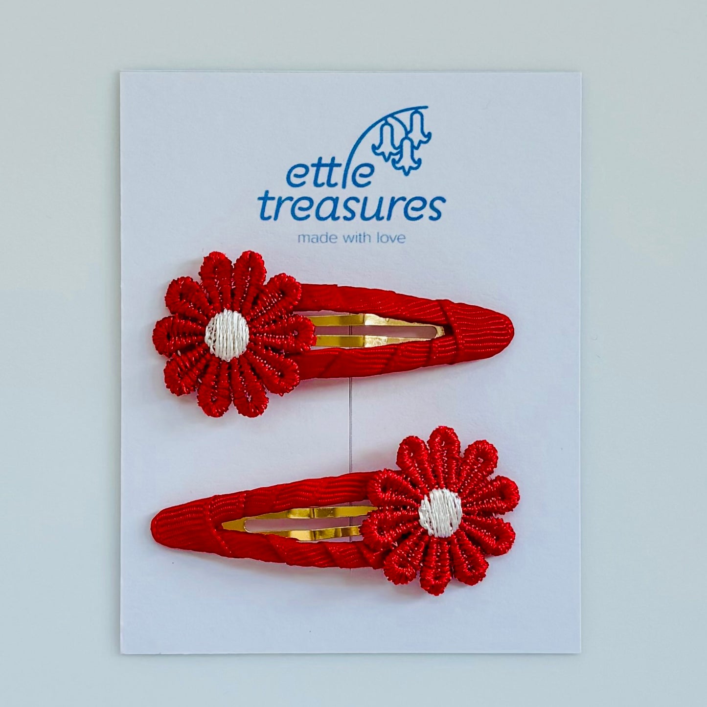 Red Daisy hair clips