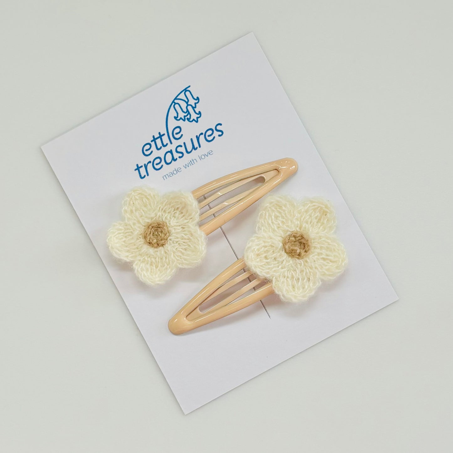 Knitted flower hair clips